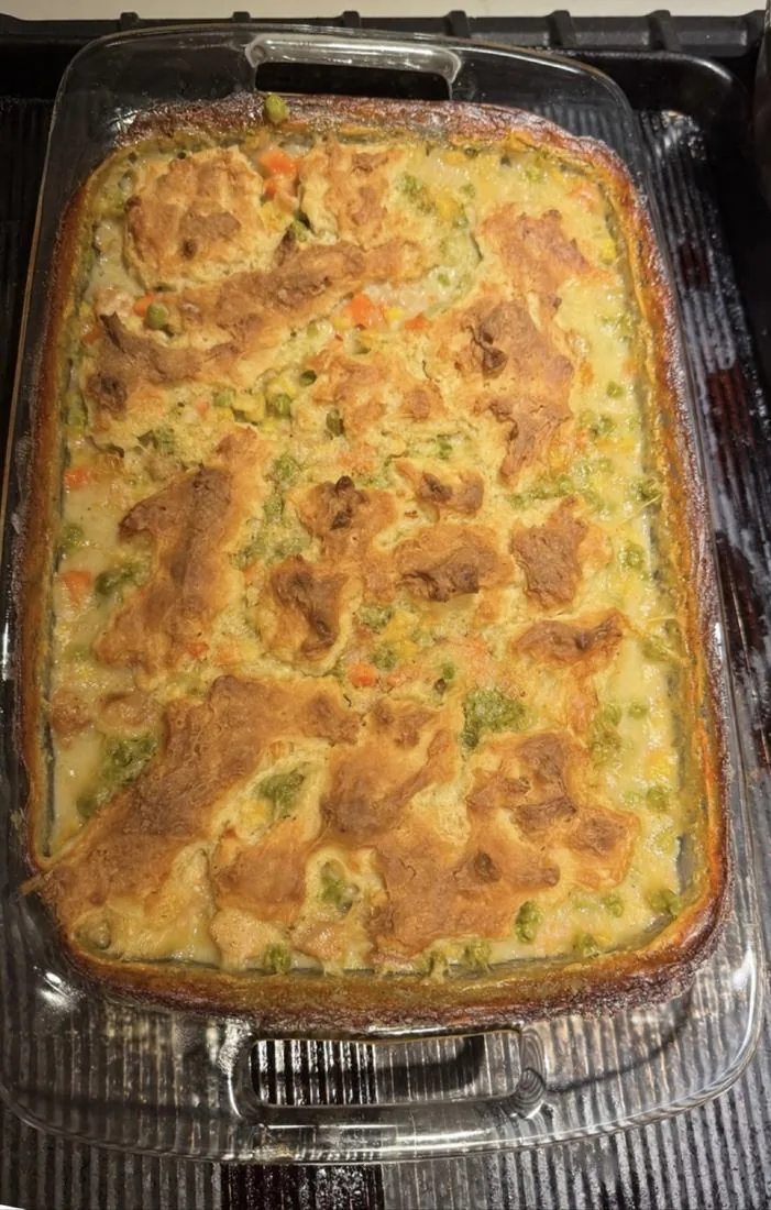High-protein chicken pot pie bake with a golden biscuit topping